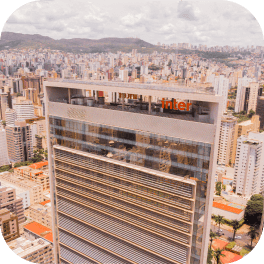 Imagem aérea com vista para a cidade de Belo Horizonte. Em destaque está o prédio sede do Inter.
